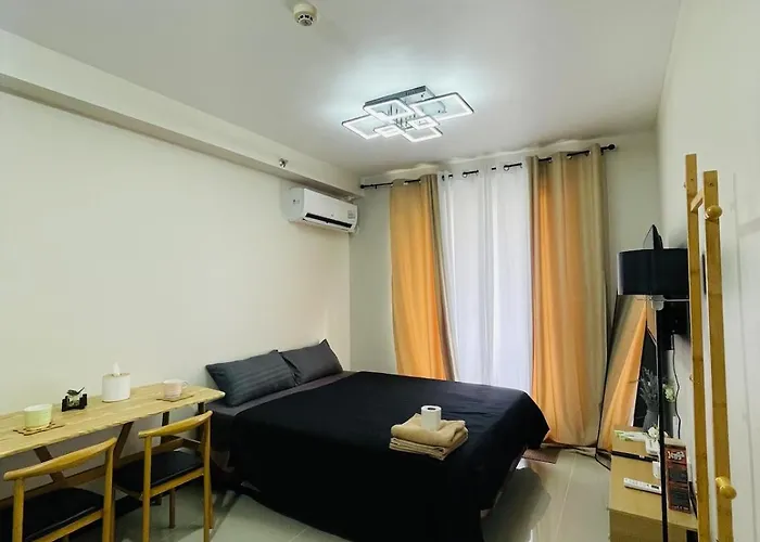J&j Mactan Netflix, Pool & Paid Parking Apartment
